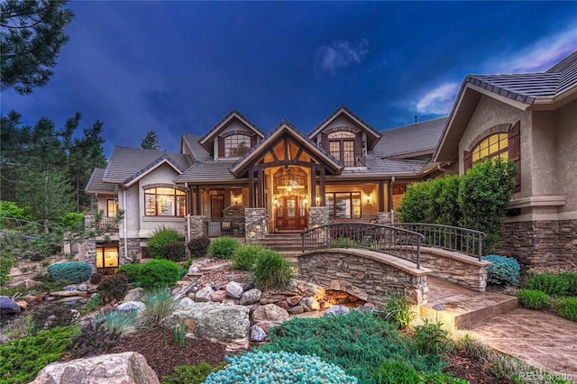 craftsman-style home featuring covered porch