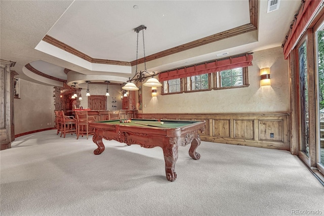 rec room featuring a raised ceiling, light carpet, ornamental molding, and pool table