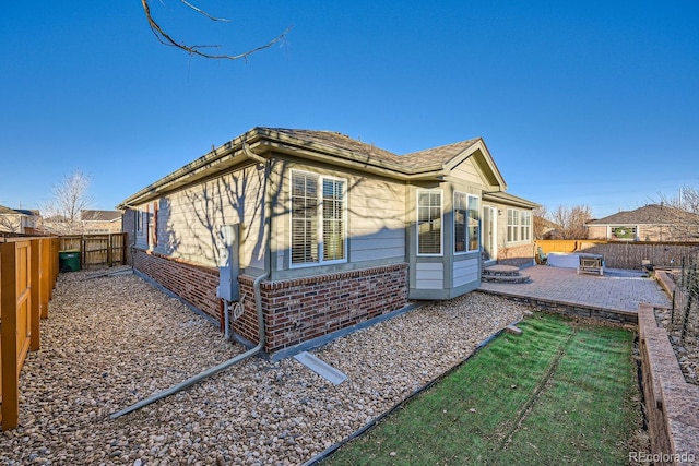 rear view of house featuring a patio area