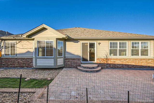 back of house featuring a patio area