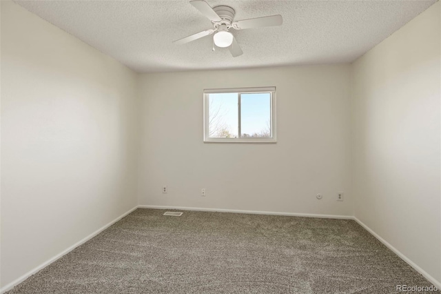 9562 W Capri Dr, Littleton, CO 80123 - carpeted spare room featuring baseboards, visible vents, a textured ceiling, and a ceiling fan