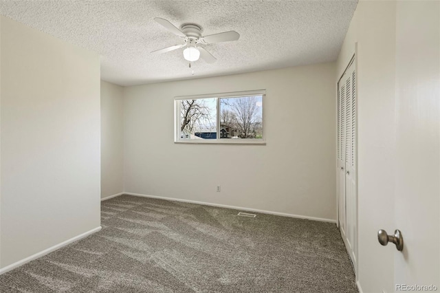 9562 W Capri Dr, Littleton, CO 80123 - unfurnished bedroom with carpet, a closet, baseboards, and a textured ceiling