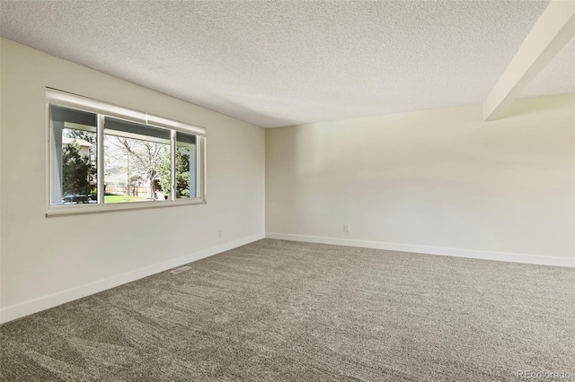 9562 W Capri Dr, Littleton, CO 80123 - spare room with baseboards, carpet flooring, and a textured ceiling