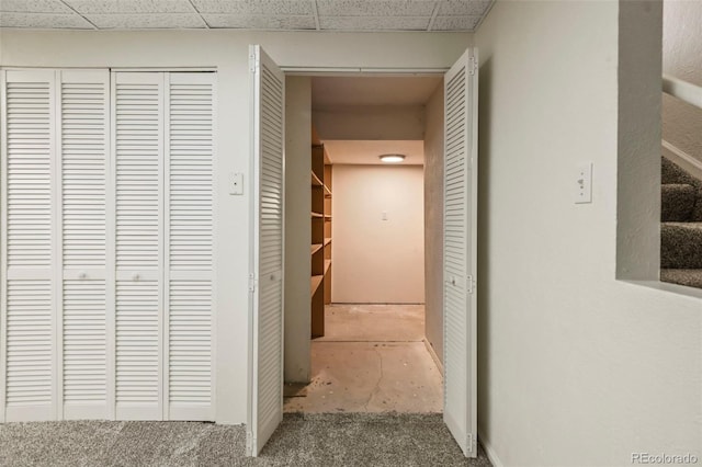 9562 W Capri Dr, Littleton, CO 80123 - hallway featuring carpet floors and a paneled ceiling