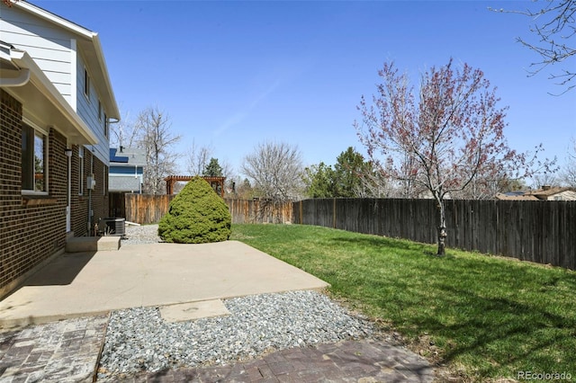 9562 W Capri Dr, Littleton, CO 80123 - view of yard featuring a patio and a fenced backyard