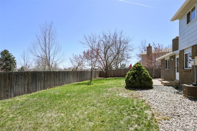 9562 W Capri Dr, Littleton, CO 80123 - view of yard featuring cooling unit and a fenced backyard