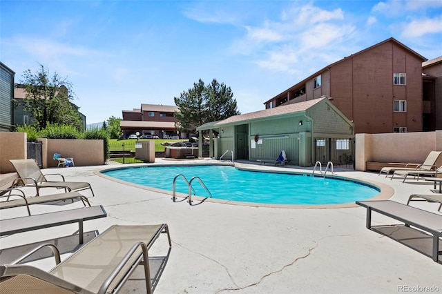 128 W Rockrimmon Blvd Unit 105, Colorado Springs, CO 80919 - community pool with a patio area