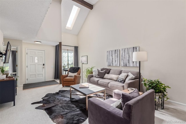 8039 E Phillips Cir, Centennial, CO 80112 - living area with light carpet, high vaulted ceiling, a skylight, and beamed ceiling