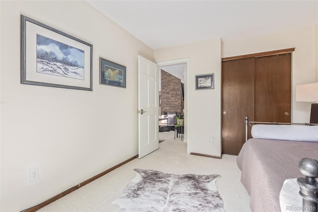 8039 E Phillips Cir, Centennial, CO 80112 - bedroom featuring light colored carpet and a closet
