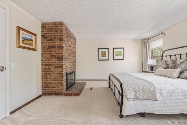 8039 E Phillips Cir, Centennial, CO 80112 - bedroom with carpet floors, a brick fireplace, and a textured ceiling
