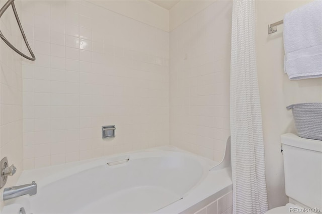 8039 E Phillips Cir, Centennial, CO 80112 - bathroom featuring shower / bathtub combination with curtain and toilet