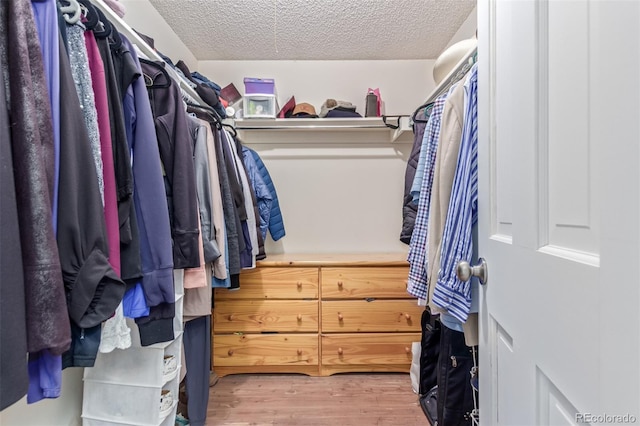 8039 E Phillips Cir, Centennial, CO 80112 - walk in closet featuring wood finished floors