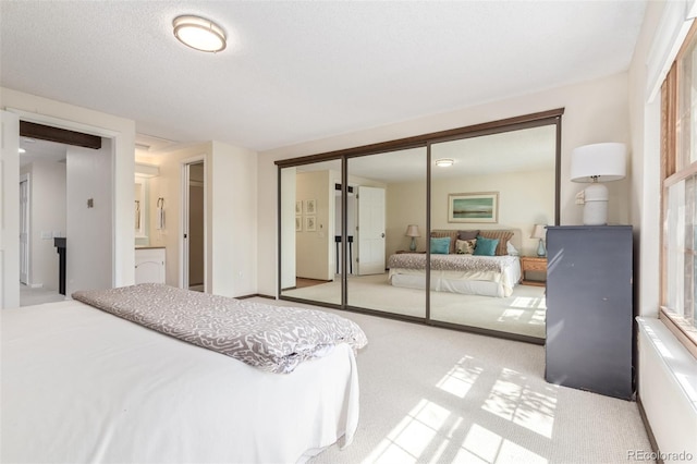 8039 E Phillips Cir, Centennial, CO 80112 - bedroom with light colored carpet, a closet, and multiple windows