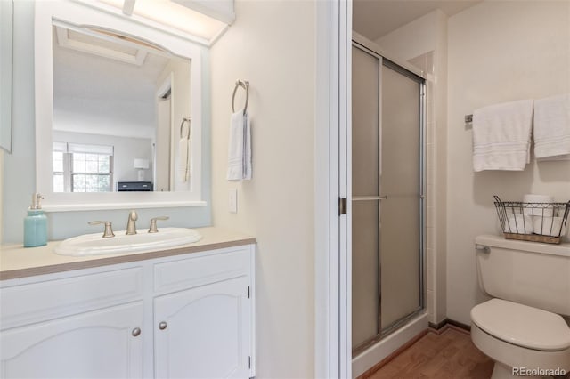 8039 E Phillips Cir, Centennial, CO 80112 - full bathroom with a shower stall, vanity, and wood finished floors