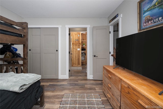 141 Forest Trl # 16, Winter Park, CO 80482 - bedroom with dark wood-style floors and a closet