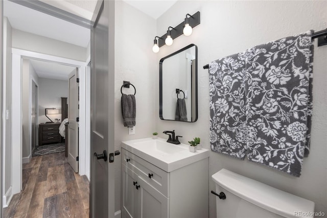 141 Forest Trl # 16, Winter Park, CO 80482 - bathroom featuring wood finished floors and vanity