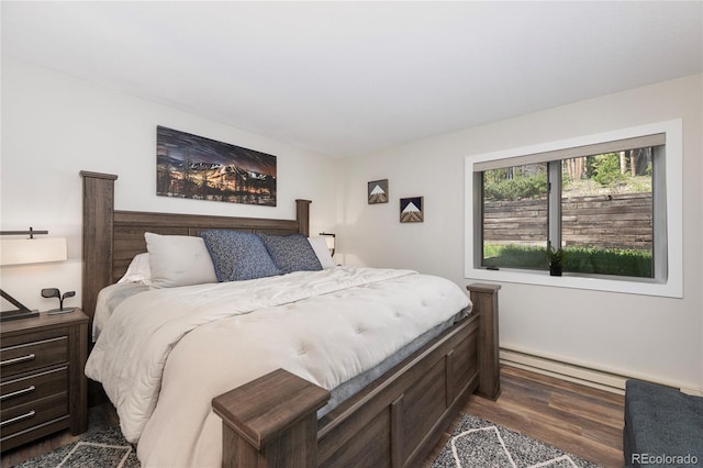 141 Forest Trl # 16, Winter Park, CO 80482 - bedroom with dark wood-style floors and baseboard heating
