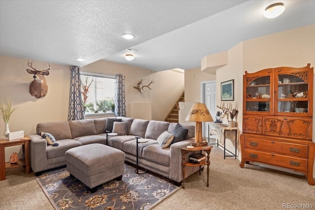 4362 Susie Vw, Colorado Springs, CO 80917 - living area featuring carpet, a textured ceiling, and stairway
