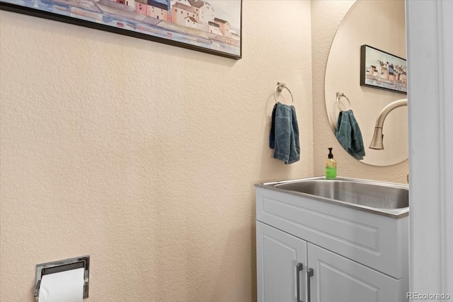 4362 Susie Vw, Colorado Springs, CO 80917 - bathroom with a textured wall and vanity