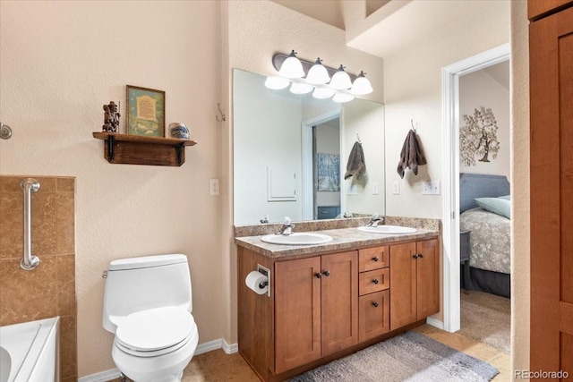 4362 Susie Vw, Colorado Springs, CO 80917 - ensuite bathroom with toilet, double vanity, and a tub