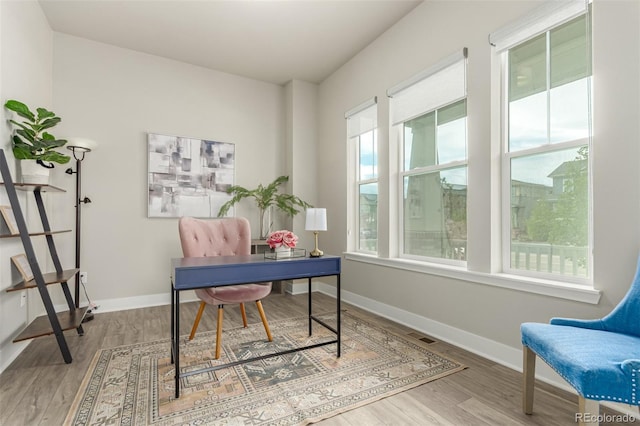 21492 E 60th Ave, Aurora, CO 80019 - office space featuring wood finished floors and baseboards