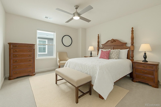 21492 E 60th Ave, Aurora, CO 80019 - bedroom with light colored carpet, visible vents, baseboards, and ceiling fan