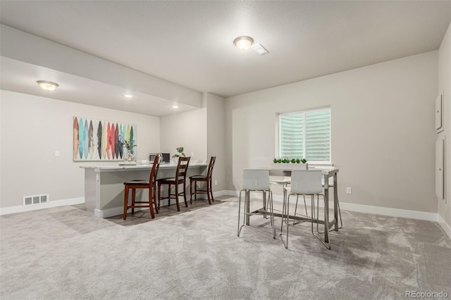 21492 E 60th Ave, Aurora, CO 80019 - carpeted dining area with baseboards, recessed lighting, and visible vents