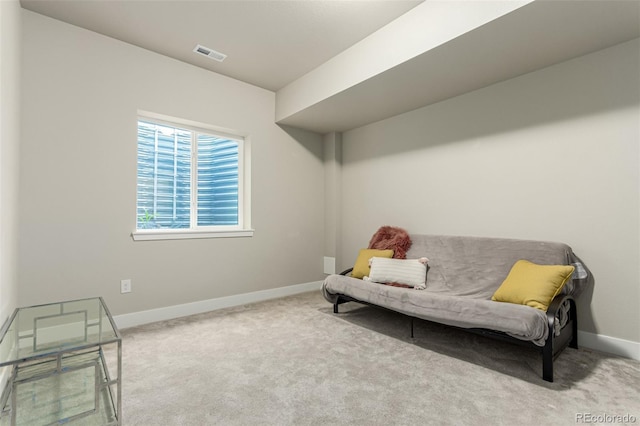 21492 E 60th Ave, Aurora, CO 80019 - living area with baseboards, visible vents, and carpet floors