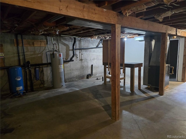 2793 S Beaver Creek Rd, Black Hawk, CO 80422 - unfinished below grade area with water heater and a water pressure tank