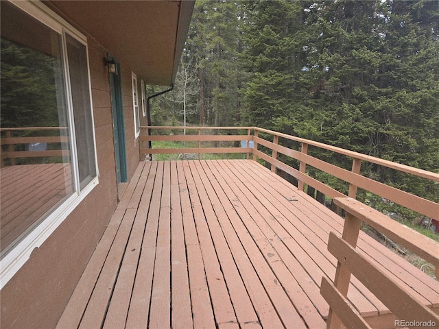 2793 S Beaver Creek Rd, Black Hawk, CO 80422 - wooden deck with a view of trees