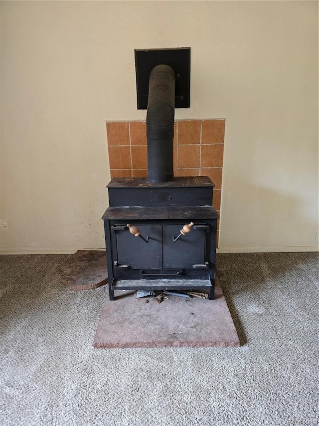 2793 S Beaver Creek Rd, Black Hawk, CO 80422 - detailed view of a wood stove and carpet