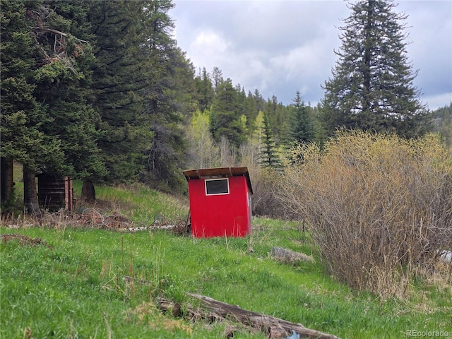 2793 S Beaver Creek Rd, Black Hawk, CO 80422 - view of yard with a wooded view