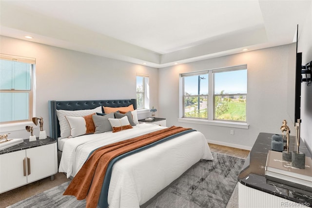 bedroom featuring recessed lighting and baseboards