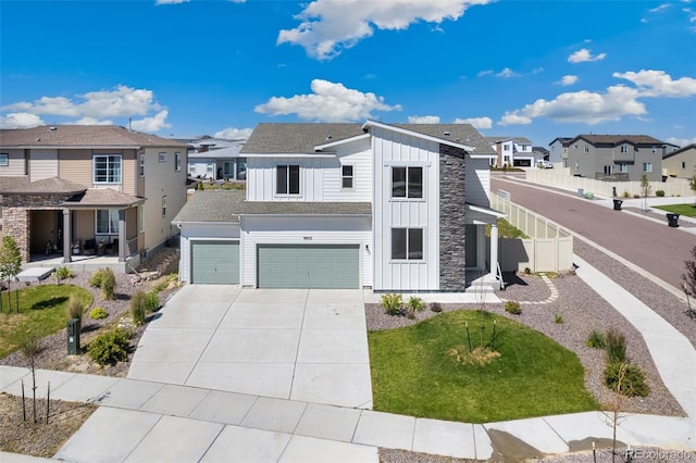 9805 Granite Park Ln, Peyton, CO 80831 - view of front of property featuring board and batten siding, a residential view, concrete driveway, and an attached garage