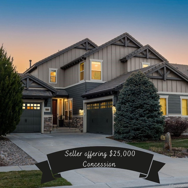10681 Sundial Rim Rd, Highlands Ranch, CO 80126 - craftsman house featuring board and batten siding, driveway, a garage, stone siding, and a tile roof