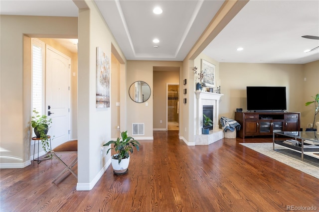 10681 Sundial Rim Rd, Highlands Ranch, CO 80126 - living area with wood finished floors, a fireplace, baseboards, recessed lighting, and a ceiling fan