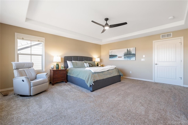 10681 Sundial Rim Rd, Highlands Ranch, CO 80126 - bedroom featuring a raised ceiling, carpet flooring, and baseboards