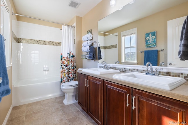 10681 Sundial Rim Rd, Highlands Ranch, CO 80126 - bathroom with shower / tub combo with curtain, toilet, double vanity, and tile patterned flooring