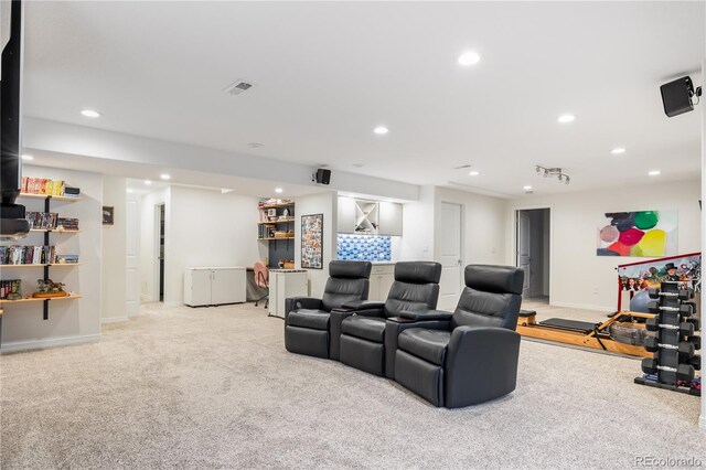 10681 Sundial Rim Rd, Highlands Ranch, CO 80126 - cinema room with light carpet, recessed lighting, and baseboards