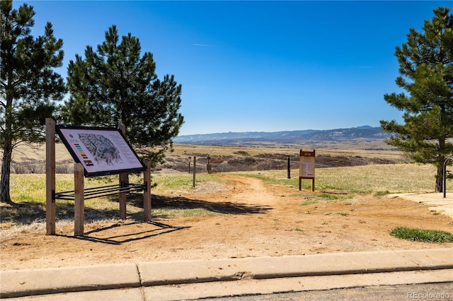 10681 Sundial Rim Rd, Highlands Ranch, CO 80126 - surrounding community with a mountain view and a view of rural / pastoral area