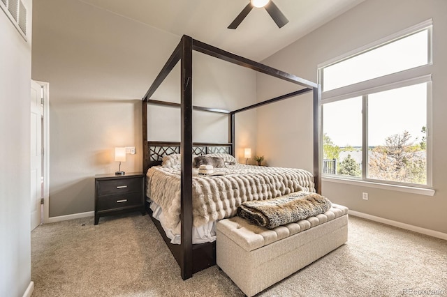 carpeted bedroom featuring baseboards and ceiling fan