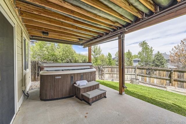 view of patio with a hot tub