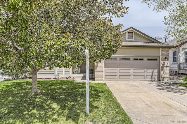 view of front facade featuring concrete driveway, a front lawn, brick siding, and an attached garage
