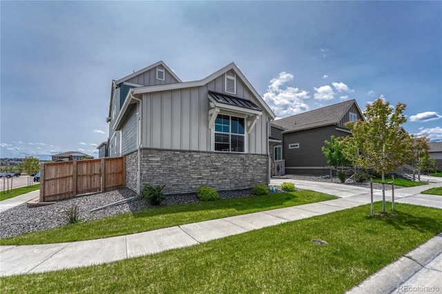 17194 Desert Wine Ln, Parker, CO 80134 - view of front of house featuring board and batten siding and stone siding