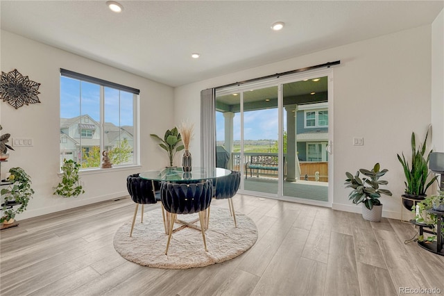 17194 Desert Wine Ln, Parker, CO 80134 - dining space with wood finished floors and recessed lighting