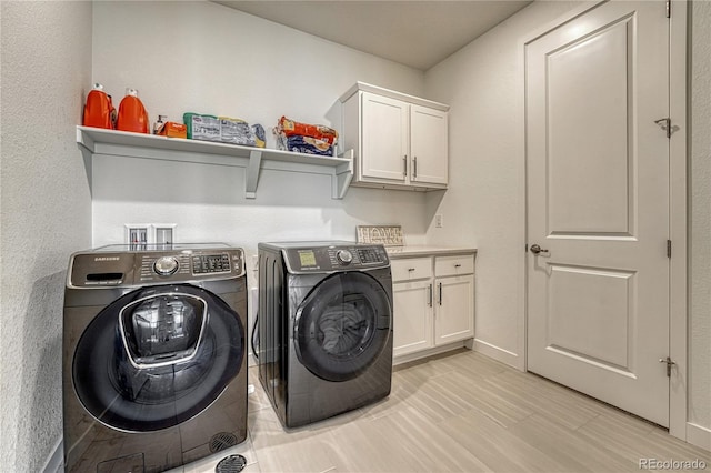 17194 Desert Wine Ln, Parker, CO 80134 - laundry room with washer and dryer and cabinet space