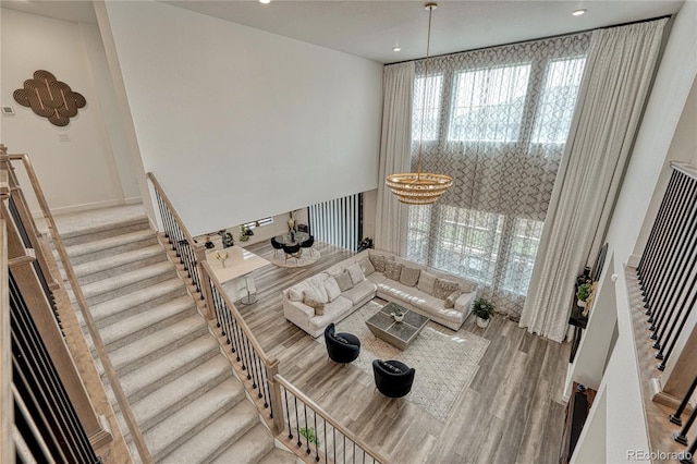 17194 Desert Wine Ln, Parker, CO 80134 - living room featuring stairway, recessed lighting, and wood finished floors