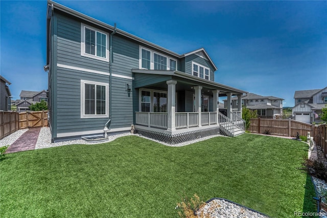 17194 Desert Wine Ln, Parker, CO 80134 - rear view of house featuring a porch and a fenced backyard