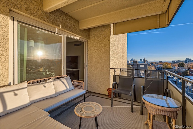 balcony featuring an outdoor living space