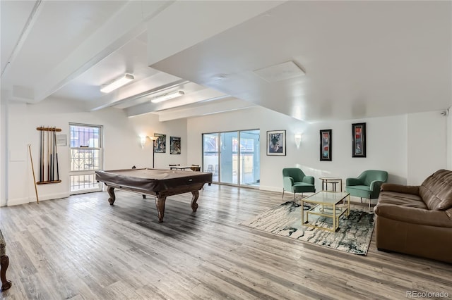 recreation room with hardwood / wood-style floors, beam ceiling, and billiards